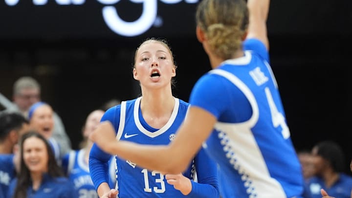 Kentucky's center Clara Strack (13) made the shot and celebrated with teammate Lexi Blue (4) against Louisville in the KFC Yum! Center.
November 22, 2025 Kentucky's center Clara Strack (13) made the shot and celebrated with teammate Lexi Blue (4) against Louisville in the KFC Yum! Center.
November 22, 2025
