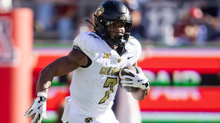 Oct 19, 2024; Tucson, Arizona, USA; Colorado Buffalos running back Dallan Hayden (7) against the Arizona Wildcats at Arizona Stadium. Mandatory Credit: Mark J. Rebilas-Imagn Images