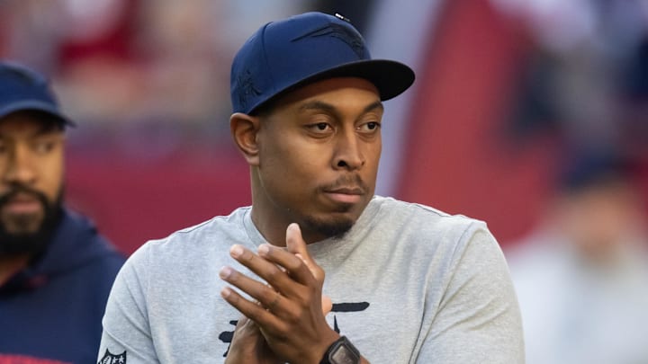 Dec 15, 2024; Glendale, Arizona, USA; New England Patriots defensive coordinator DeMarcus Covington against the Arizona Cardinals at State Farm Stadium. Mandatory Credit: Mark J. Rebilas-Imagn Images