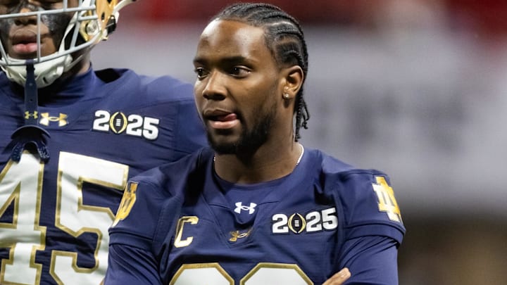 Jan 20, 2025; Atlanta, GA, USA; Injured Notre Dame Fighting Irish cornerback Benjamin Morrison (20) against the Ohio State Buckeyes during the CFP National Championship college football game at Mercedes-Benz Stadium. Mandatory Credit: Mark J. Rebilas-Imagn Images
