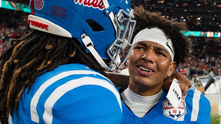 Ole Miss quarterback Trinidad Chambliss (6) cries after losing the CFP Fiesta Bowl.