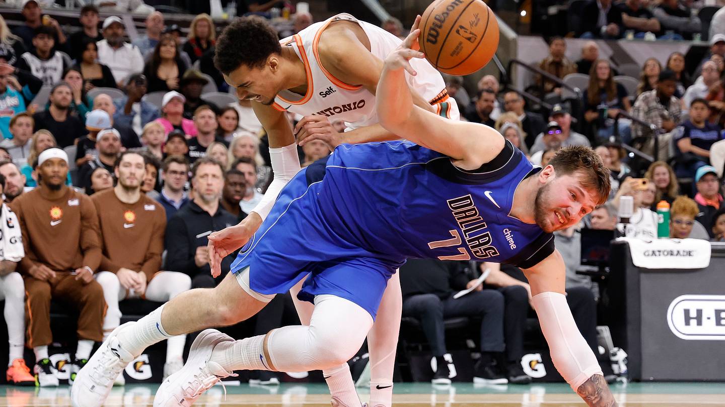 Wembanyama's NBA Debut: Doncic Shines in Triple-Double