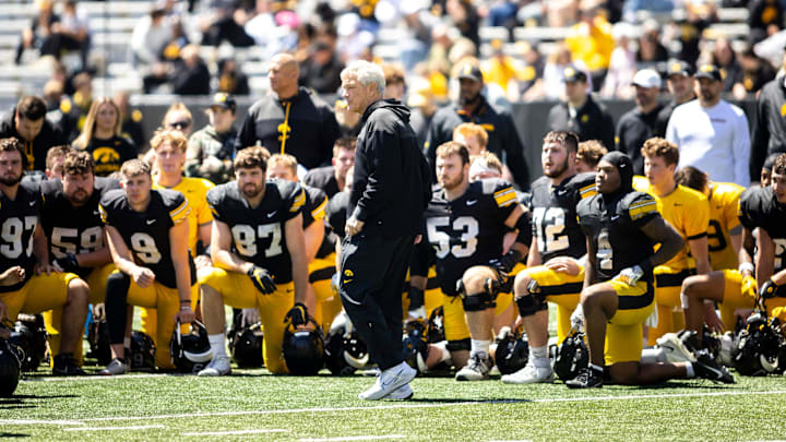 Apr 26, 2025; Iowa City, IA, USA; Iowa head coach Kirk Ferentz talks with players during a spring NCAA football open practice at Kinnick Stadium. Mandatory Credit: Joseph Cress-The Des Moines Register