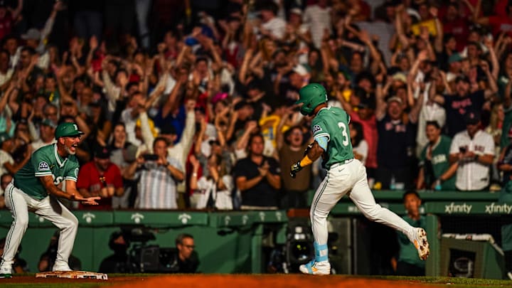 Boston, Massachusetts, USA; Boston Red Sox outfielder Ceddanne Rafaela (3) hits a two-run home run to win the game against the Tampa Bay Rays in the ninth inning at Fenway Park.