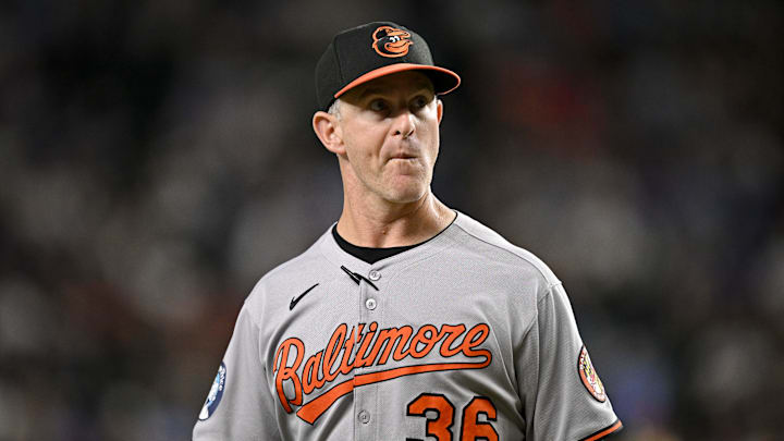 Jul 2, 2025; Arlington, Texas, USA; Baltimore Orioles interim manager Tony Mansolino (36) walks back to the dugout during the fifth inning against the Texas Rangers at Globe Life Field. Mandatory Credit: Jerome Miron-Imagn Images Jul 2, 2025; Arlington, Texas, USA; Baltimore Orioles interim manager Tony Mansolino (36) walks back to the dugout during the fifth inning against the Texas Rangers at Globe Life Field. Mandatory Credit: Jerome Miron-Imagn Images