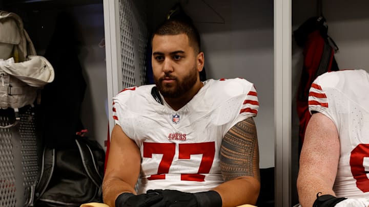 San Francisco 49ers right guard Dominick Puni (77)