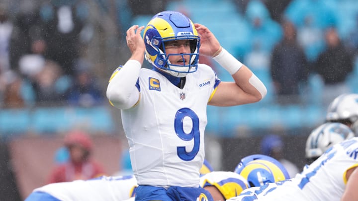 Nov 30, 2025; Charlotte, North Carolina, USA; Los Angeles Rams quarterback Matthew Stafford (9) calls a play during the fourth quarter against the Carolina Panthers at Bank of America Stadium. Mandatory Credit: Scott Kinser-Imagn Images