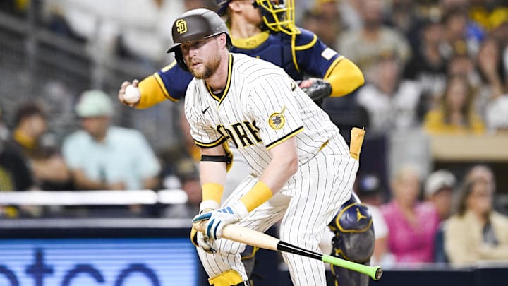 Sep 22, 2025; San Diego, California, USA; San Diego Padres second baseman Jake Cronenworth (9) reacts after a called stirke out during the eighth inning against the Milwaukee Brewers at Petco Park. Mandatory Credit: Denis Poroy-Imagn Images