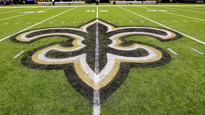 Oct 30, 2022; New Orleans, Louisiana, USA;  General view of the New Orleans Saints logo as the midfield logo fleur-de-lis after the game between the New Orleans Saints and the Las Vegas Raiders at Caesars Superdome. Mandatory Credit: Stephen Lew-Imagn Images