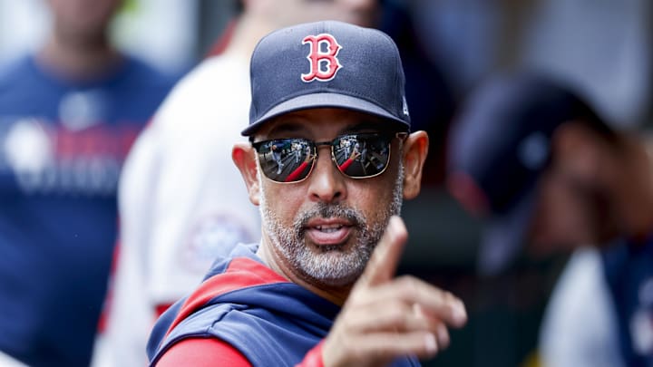 Jun 18, 2025; Seattle, Washington, USA; Boston Red Sox manager Alex Cora (13) stands in the dugout following the inning against the Seattle Mariners at T-Mobile Park. Mandatory Credit: Joe Nicholson-Imagn Images Jun 18, 2025; Seattle, Washington, USA; Boston Red Sox manager Alex Cora (13) stands in the dugout following the inning against the Seattle Mariners at T-Mobile Park. Mandatory Credit: Joe Nicholson-Imagn Images