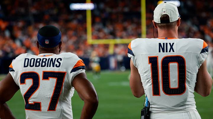 Aug 21, 2026; Denver, Colorado, USA; Denver Broncos running back J.K. Dobbins (27) and quarterback Bo Nix (10) look on in the third quarter against the Green Bay Packers at Empower Field at Mile High. Aug 21, 2026; Denver, Colorado, USA; Denver Broncos running back J.K. Dobbins (27) and quarterback Bo Nix (10) look on in the third quarter against the Green Bay Packers at Empower Field at Mile High.