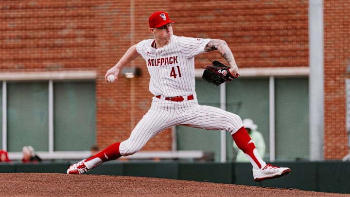 Jacob Dudan throws a pitch. Jacob Dudan throws a pitch.