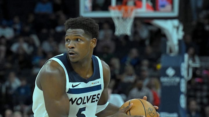 Oct 7, 2025; Minneapolis, Minnesota, USA; Minnesota Timberwolves guard Anthony Edwards (5) controls the ball against the Indiana Pacers during the second quarter at Target Center. Mandatory Credit: Nick Wosika-Imagn Images
