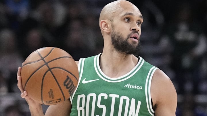 Mar 2, 2026; Milwaukee, Wisconsin, USA; Boston Celtics guard Derrick White (9) brings the ball up the court against Milwaukee Bucks in the second half at Fiserv Forum. Mandatory Credit: Michael McLoone-Imagn Images