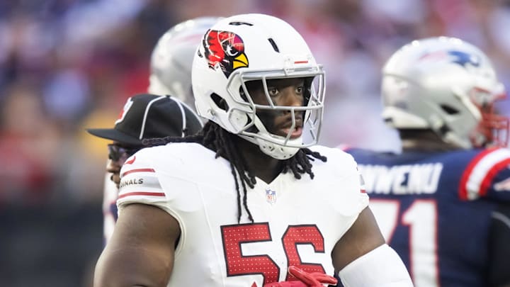 Dec 15, 2024; Glendale, Arizona, USA; Arizona Cardinals defensive end Darius Robinson (56) against the New England Patriots at State Farm Stadium. Mandatory Credit: Mark J. Rebilas-Imagn Images Dec 15, 2024; Glendale, Arizona, USA; Arizona Cardinals defensive end Darius Robinson (56) against the New England Patriots at State Farm Stadium. Mandatory Credit: Mark J. Rebilas-Imagn Images