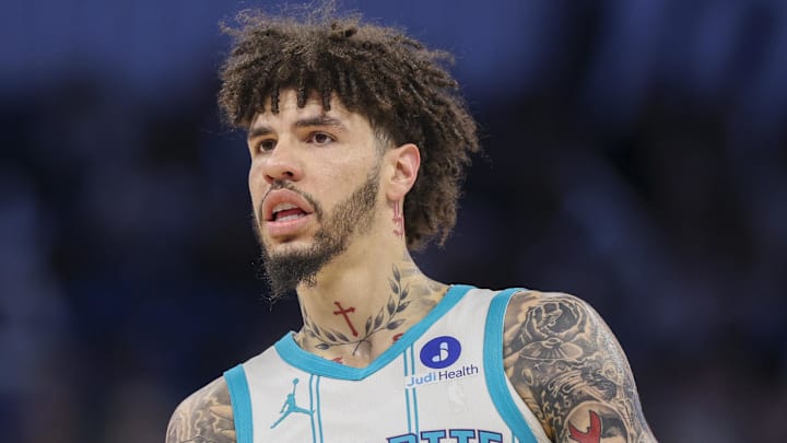 Jan 22, 2026; Orlando, Florida, USA; Charlotte Hornets guard LaMelo Ball (1) looks on against the Orlando Magic in the first quarter at Kia Center. Mandatory Credit: Nathan Ray Seebeck-Imagn Images