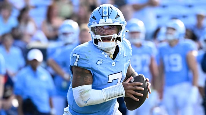 Sep 13, 2025; Chapel Hill, North Carolina, USA; North Carolina Tar Heels quarterback Gio Lopez (7) looks to pass in the third quarter at Kenan Stadium. Mandatory Credit: Bob Donnan-Imagn Images