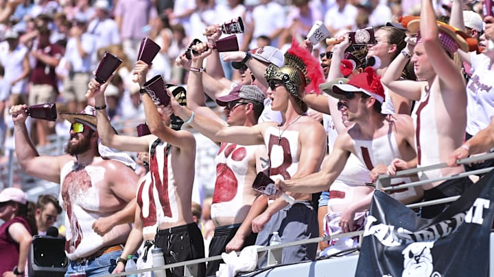 Mississippi State Bulldogs fans cheer during the second quarter against the Florida Gators at Davis Wade Stadium at Scott Field. Mississippi State Bulldogs fans cheer during the second quarter against the Florida Gators at Davis Wade Stadium at Scott Field.