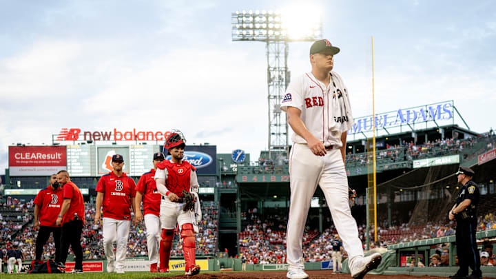 Boston Red Sox starting pitcher Richard Fitts walks off the mound in Fenway Park.