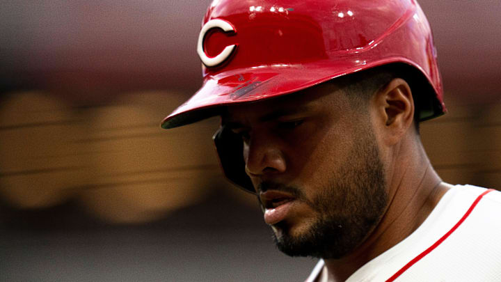 Cincinnati Reds first baseman Jeimer Candelario (3) returns to the dugout after hitting a pop fly in the fourth inning of the MLB game between the Cincinnati Reds and the St. Louis Cardinals at Great American Ball Park in Cincinnati on Tuesday, Aug. 13, 2024.