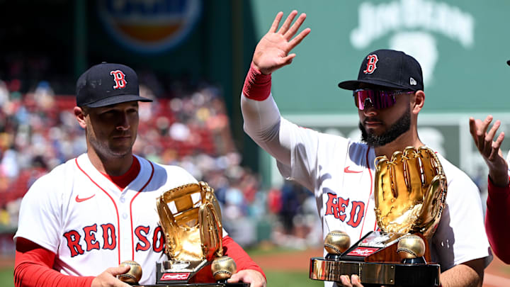 Apr 24, 2025; Boston, Massachusetts, USA; Boston Red Sox third base Alex Bregman (2) and outfielder Wilyer Abreu (52) wave to the crowd after receiving their 2024 Golden Glove awards before a game against the Seattle Mariners at Fenway Park. Mandatory Credit: Brian Fluharty-Imagn Images Apr 24, 2025; Boston, Massachusetts, USA; Boston Red Sox third base Alex Bregman (2) and outfielder Wilyer Abreu (52) wave to the crowd after receiving their 2024 Golden Glove awards before a game against the Seattle Mariners at Fenway Park. Mandatory Credit: Brian Fluharty-Imagn Images