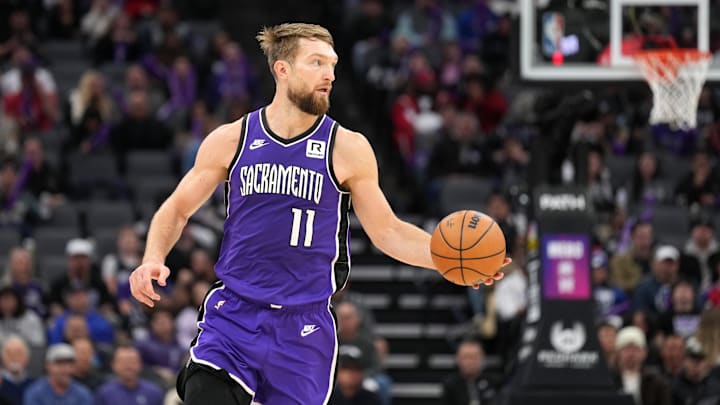 Nov 24, 2024; Sacramento, California, USA; Sacramento Kings forward Domantas Sabonis (11) dribbles against the Brooklyn Nets during the third quarter at Golden 1 Center. Mandatory Credit: Darren Yamashita-Imagn Images
