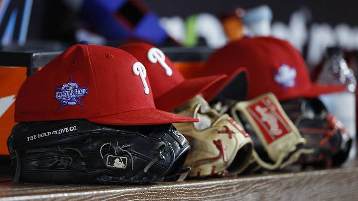 May 2, 2026; Miami, Florida, USA;  Philadelphia Phillies starting hats and gloves sit on the bench against the Miami Marlins during the fifth inning at loanDepot Park.