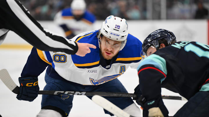 Apr 12, 2025; Seattle, Washington, USA; St. Louis Blues center Robert Thomas (18) waits for the puck to drop during a face off in the first period against the Seattle Kraken at Climate Pledge Arena. Mandatory Credit: Steven Bisig-Imagn Images