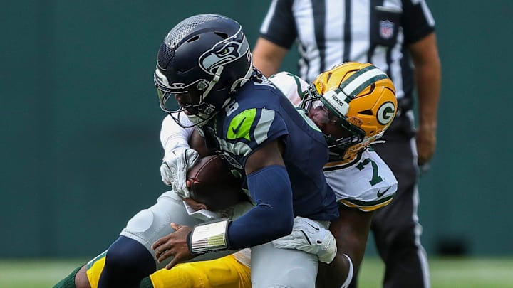 Green Bay Packers linebacker Quay Walker (7) tackles Seattle Seahawks quarterback Jalen Milroe (6) during their final preseason game on Saturday, August 23, 2025, at Lambeau Field in Green Bay, Wis. 
Tork Mason/USA TODAY NETWORK-Wisconsin