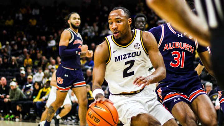 Mizzou men's basketball guard Tamar Bates dribbles during a game against Auburn on Tuesday at Mizzou Arena in Columbia