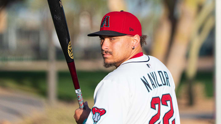 Feb 19, 2025; Scottsdale, AZ, USA; Arizona Diamondbacks infielder Josh Naylor (32) poses for a portrait for MLB Media Day at Salt River Fields. Mandatory Credit: Allan Henry-Imagn Images Feb 19, 2025; Scottsdale, AZ, USA; Arizona Diamondbacks infielder Josh Naylor (32) poses for a portrait for MLB Media Day at Salt River Fields. Mandatory Credit: Allan Henry-Imagn Images