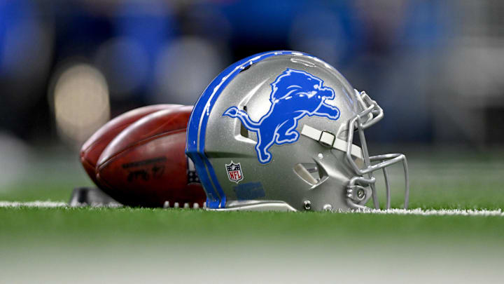 Jan 14, 2024; Detroit, Michigan, USA;  Footballs and a Detroit Lions helmet before a 2024 NFC wild card game between the Lions and Los Angeles Rams at Ford Field. Mandatory Credit: Lon Horwedel-Imagn Images