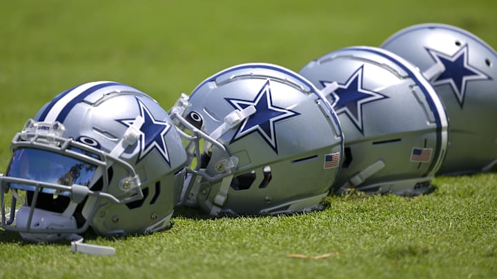 Jul 26, 2023; Oxnard, CA, USA; General view of player helmets on the field during training camp at River Ridge Playing Fields in Oxnard, CA.