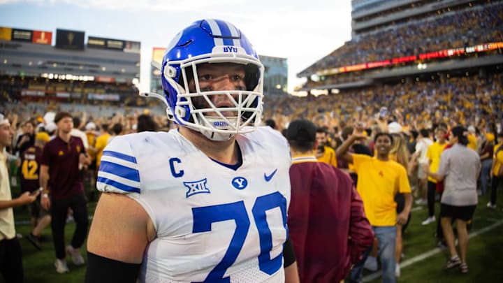 Nov 23, 2024; Tempe, Arizona, USA; Brigham Young Cougars offensive lineman Connor Pay (70) against the Arizona State Sun Devils at Mountain America Stadium. Mandatory Credit: Mark J. Rebilas-Imagn Images