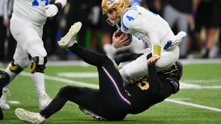 Edge rusher Russell Davis II, shown sacking UCLA quarterback Ethan Garbers, was lost for the season with a recent injury. Edge rusher Russell Davis II, shown sacking UCLA quarterback Ethan Garbers, was lost for the season with a recent injury.