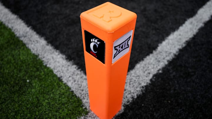 Oct 14, 2023; Cincinnati, Ohio, USA; A view of the Cincinnati and Big XII logo on an end zone pylon before a game between the Iowa State Cyclones and the Cincinnati Bearcats at Nippert Stadium. Mandatory Credit: Aaron Doster-Imagn Images Oct 14, 2023; Cincinnati, Ohio, USA; A view of the Cincinnati and Big XII logo on an end zone pylon before a game between the Iowa State Cyclones and the Cincinnati Bearcats at Nippert Stadium. Mandatory Credit: Aaron Doster-Imagn Images