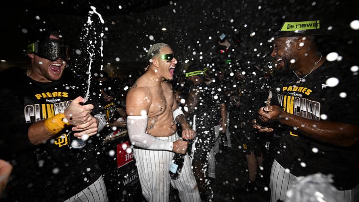 Sep 30, 2026; San Diego, California, USA;  San Diego Padres third baseman Manny Machado (13) celebrates after defeating Chicago Cubs during game two of the Wildcard round for the 2026 MLB Playoffs at Petco Park.  Mandatory Credit: Denis Poroy-Imagn Images
