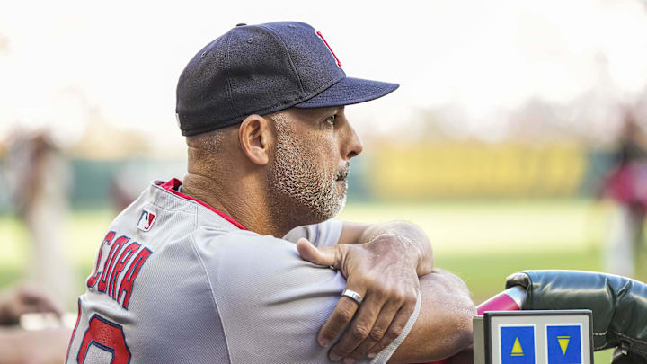May 30, 2025; Cumberland, Georgia, USA; Boston Red Sox manager Alex Cora (13) in the dugout against the Atlanta Braves during the first inning at Truist Park. Mandatory Credit: Dale Zanine-Imagn Images May 30, 2025; Cumberland, Georgia, USA; Boston Red Sox manager Alex Cora (13) in the dugout against the Atlanta Braves during the first inning at Truist Park. Mandatory Credit: Dale Zanine-Imagn Images