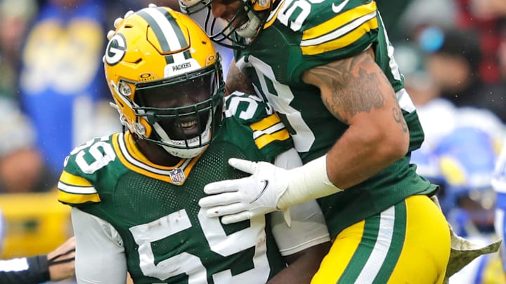 Green Bay Packers linebacker De'Vondre Campbell (59) celebrates his fumble recovery with linebacker