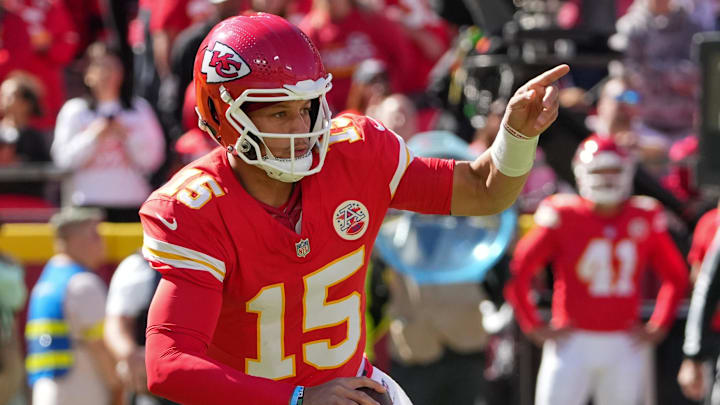 Oct 19, 2025; Kansas City, Missouri, USA; Las Vegas Raiders quarterback Kenny Pickett (15) scrambles with the ball against the Las Vegas Raiders during the second quarter of the game at GEHA Field at Arrowhead Stadium. Mandatory Credit: Denny Medley-Imagn Images