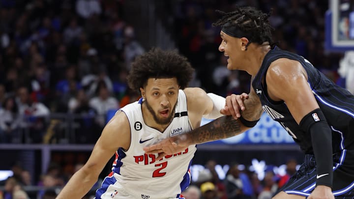 Oct 19, 2022; Detroit, Michigan, USA; Detroit Pistons guard Cade Cunningham (2) dribbles defended by Orlando Magic forward Paolo Banchero (5) in the second half at Little Caesars Arena. Mandatory Credit: Rick Osentoski-Imagn Images Oct 19, 2022; Detroit, Michigan, USA; Detroit Pistons guard Cade Cunningham (2) dribbles defended by Orlando Magic forward Paolo Banchero (5) in the second half at Little Caesars Arena. Mandatory Credit: Rick Osentoski-Imagn Images