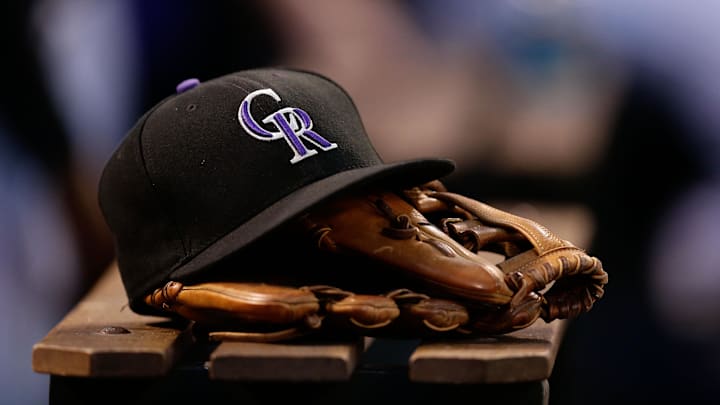 Jun 20, 2017; Denver, CO, USA; A general view of a Colorado Rockies hat and glove in the sixth inning of the game against the Arizona Diamondbacks at Coors Field. Mandatory Credit: Isaiah J. Downing-Imagn Images