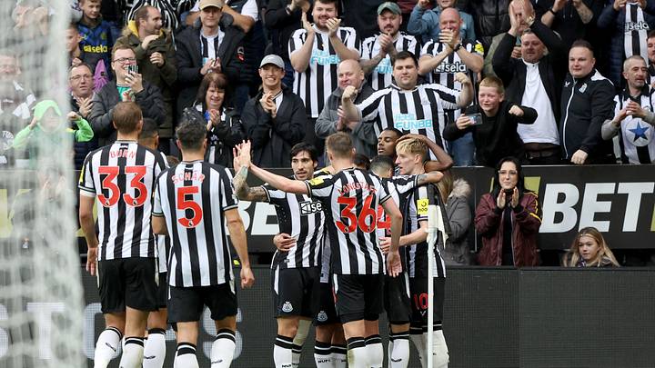 Newcastle celebrate Alexander Isak's successful penalty against Burnley