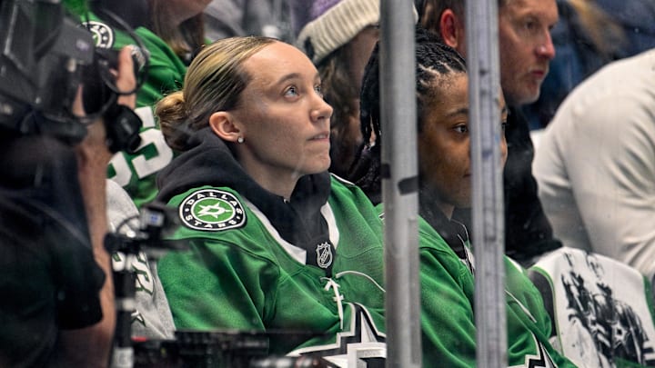 May 13, 2025; Dallas, Texas, USA; Dallas Wings guard Paige Bueckers watches the game between the Dallas Stars and the Winnipeg Jets during the first period in game four of the second round of the 2025 Stanley Cup Playoffs at American Airlines Center. Mandatory Credit: Jerome Miron-Imagn Images