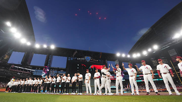 The Arizona Diamondbacks take the field to play their Opening Day game against the Chicago Cubs at Chase Field in Phoenix, on March 27, 2025. The Arizona Diamondbacks take the field to play their Opening Day game against the Chicago Cubs at Chase Field in Phoenix, on March 27, 2025.