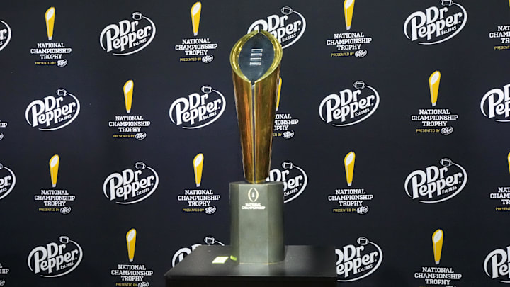 Jan 7, 2024; Houston, TX, USA; The College Football Playoff national championship trophy at the CFP Fan Central at the George R. Brown Convention Center. Mandatory Credit: Kirby Lee-Imagn Images