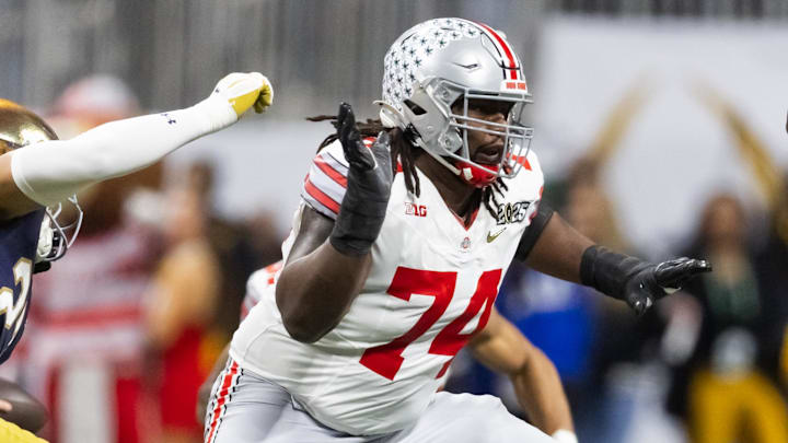 Jan 20, 2025; Atlanta, GA, USA; Ohio State Buckeyes offensive lineman Donovan Jackson (74) against the Notre Dame Fighting Irish during the CFP National Championship college football game at Mercedes-Benz Stadium. Mandatory Credit: Mark J. Rebilas-Imagn Images