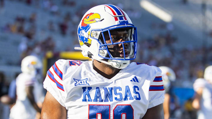Oct 5, 2024; Tempe, Arizona, USA; Kansas Jayhawks defensive tackle D.J. Withers (52) against the Arizona State Sun Devils at Mountain America Stadium. Mandatory Credit: Mark J. Rebilas-Imagn Images
