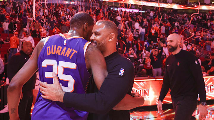 Feb 12, 2025; Houston, Texas, USA; Phoenix Suns forward Kevin Durant (35) hugs Houston Rockets head coach Ime Udoka after a game at Toyota Center. Mandatory Credit: Thomas Shea-Imagn Images