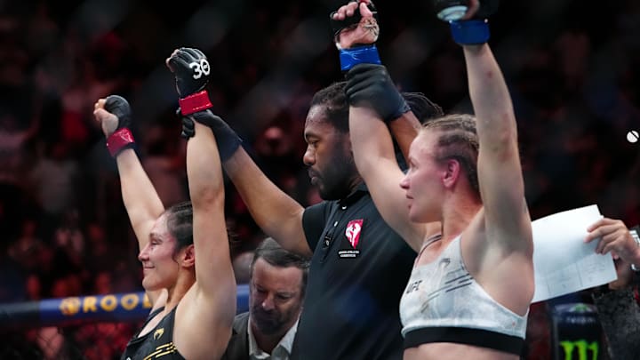Sep 16, 2023; Las Vegas, Nevada, USA; Alexa Grasso (red gloves) and Valentina Shevchenko (blue